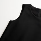 Black tunic on a white background