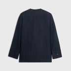 Dark blue jacket on a light gray background