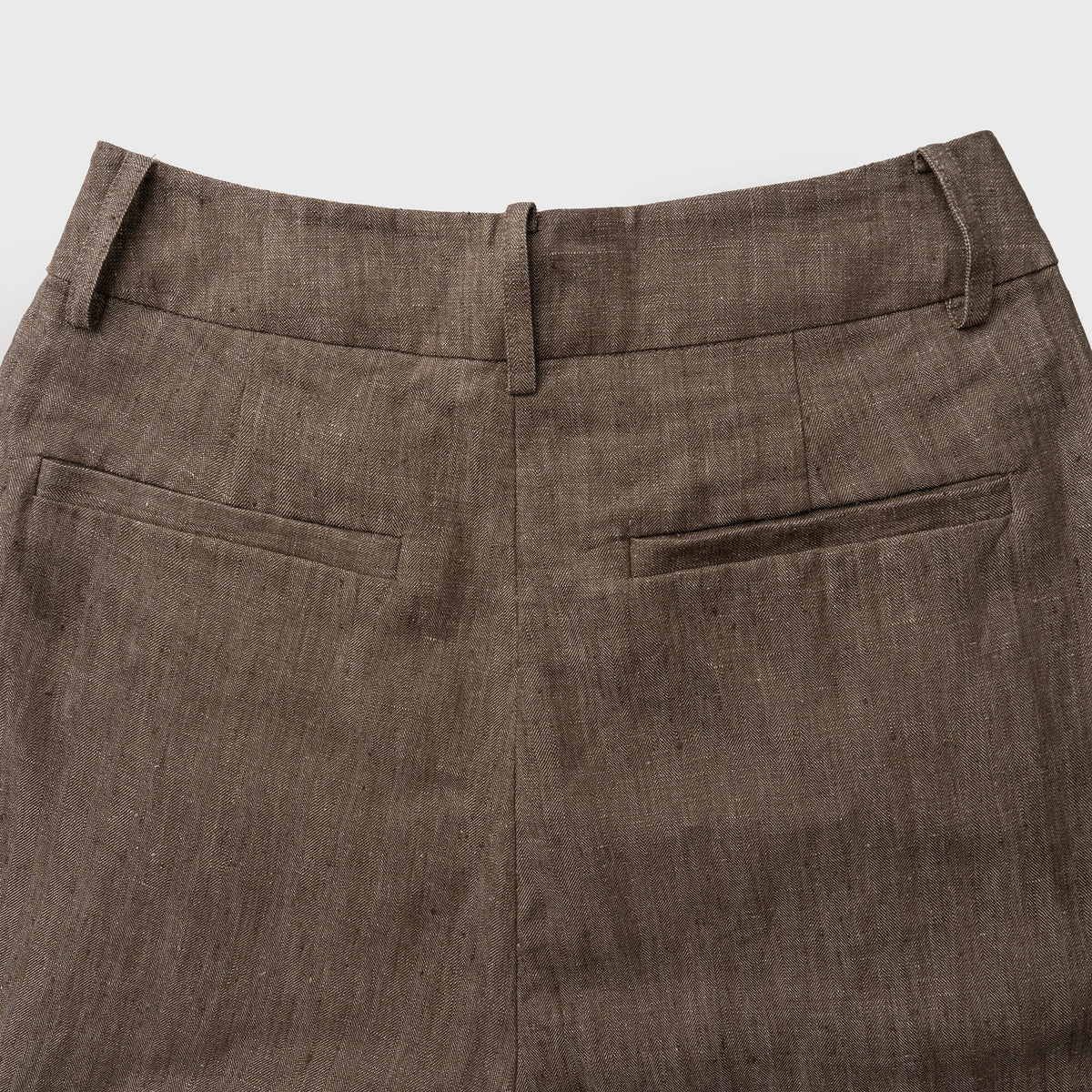 Brown pants with a plain background