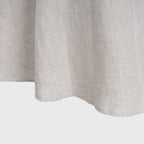 Close-up of a light beige fabric texture on a white background