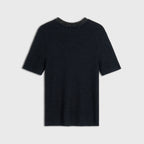 Black wool knit with a textured collar on a light gray background