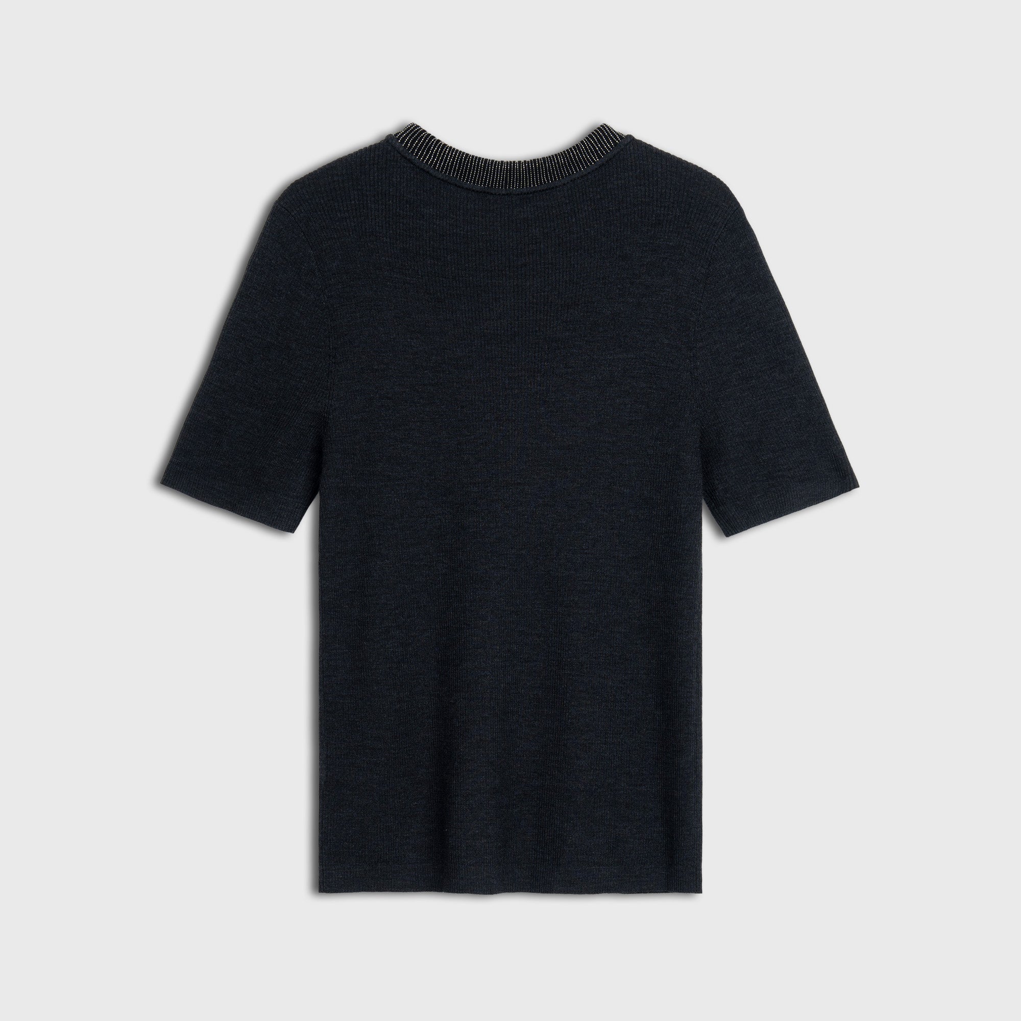 Black wool knit with a textured collar on a light gray background