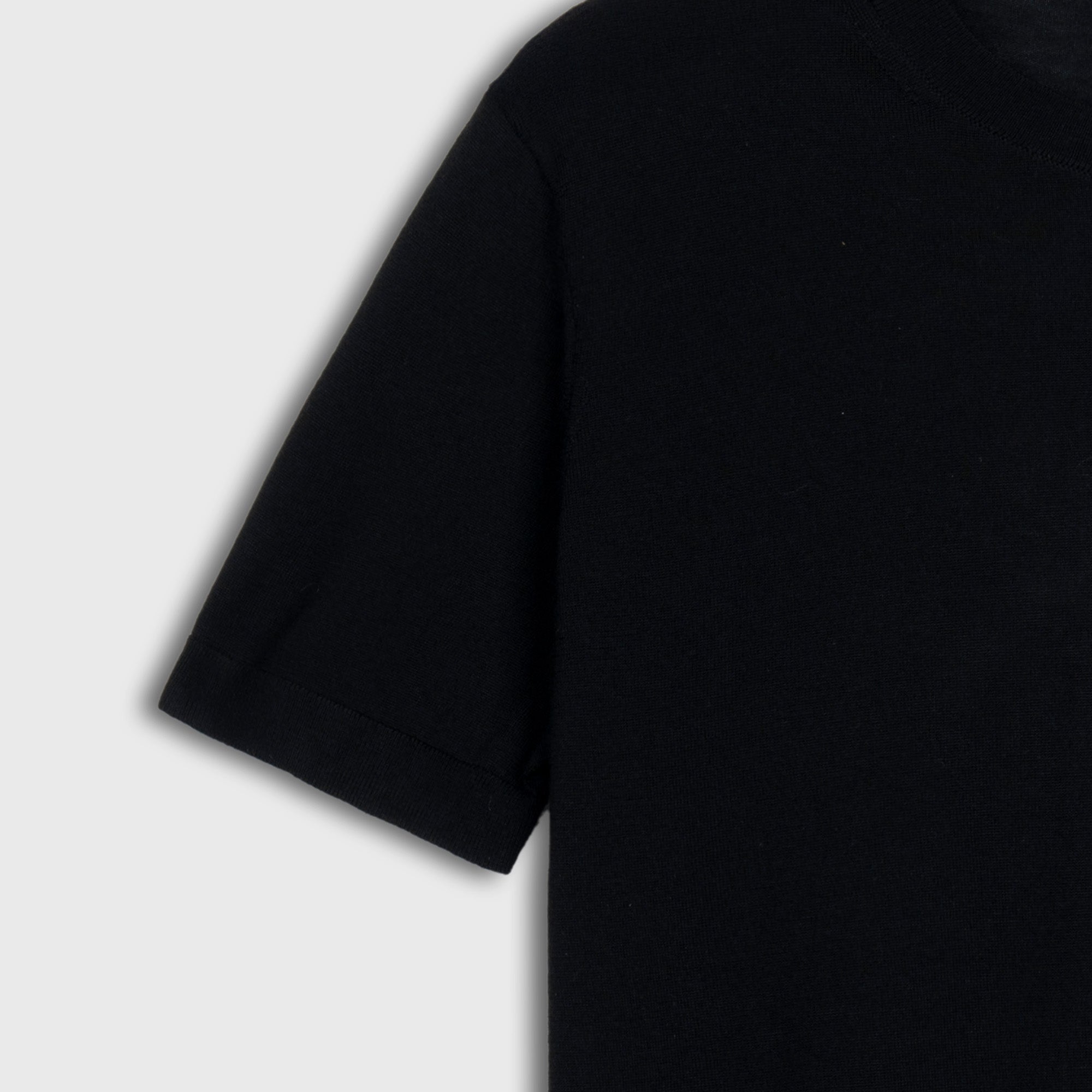 Black wool shirt  on a light gray background