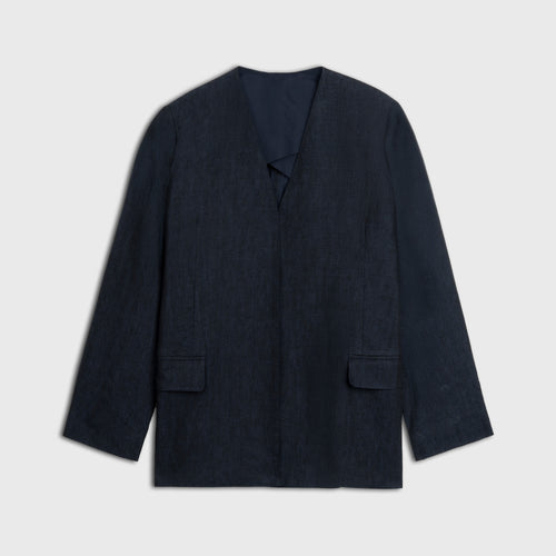 Dark blue blazer on a light gray background