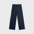 Navy blue pants on a light gray background