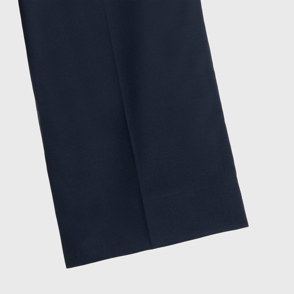 Dark blue fabric on a light gray background