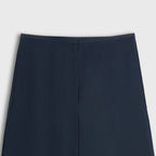Navy blue pants on a light gray background