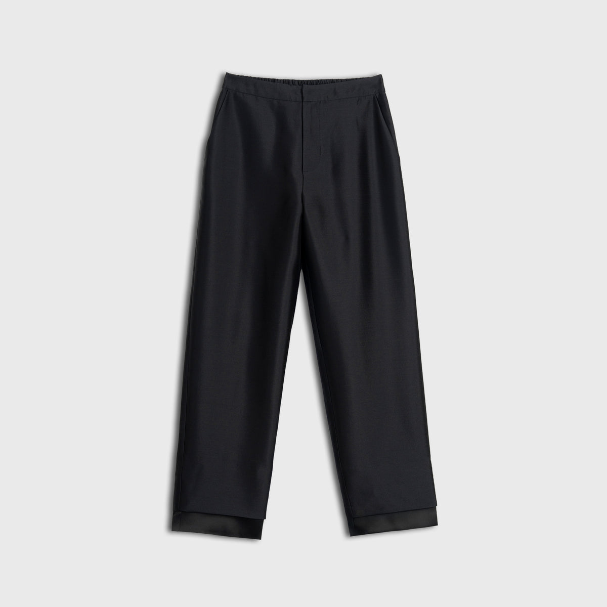 Black pants on a light gray background