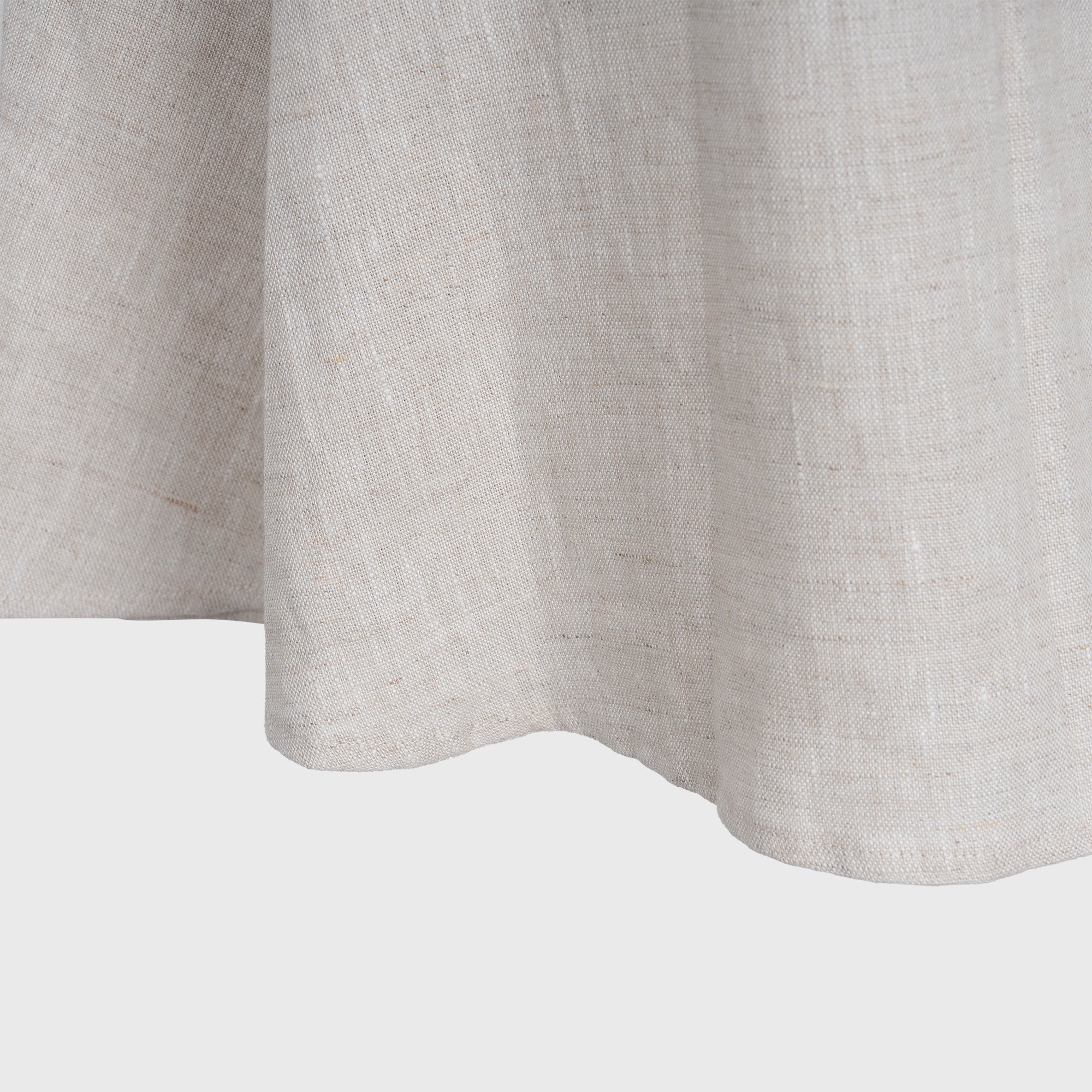 Close-up of a light beige fabric texture on a white background