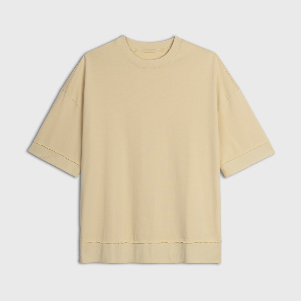 Yellow t-shirt on a light gray background