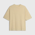 Yellow t-shirt on a light gray background