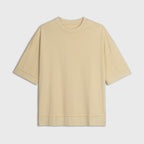 Yellow t-shirt on a light gray background