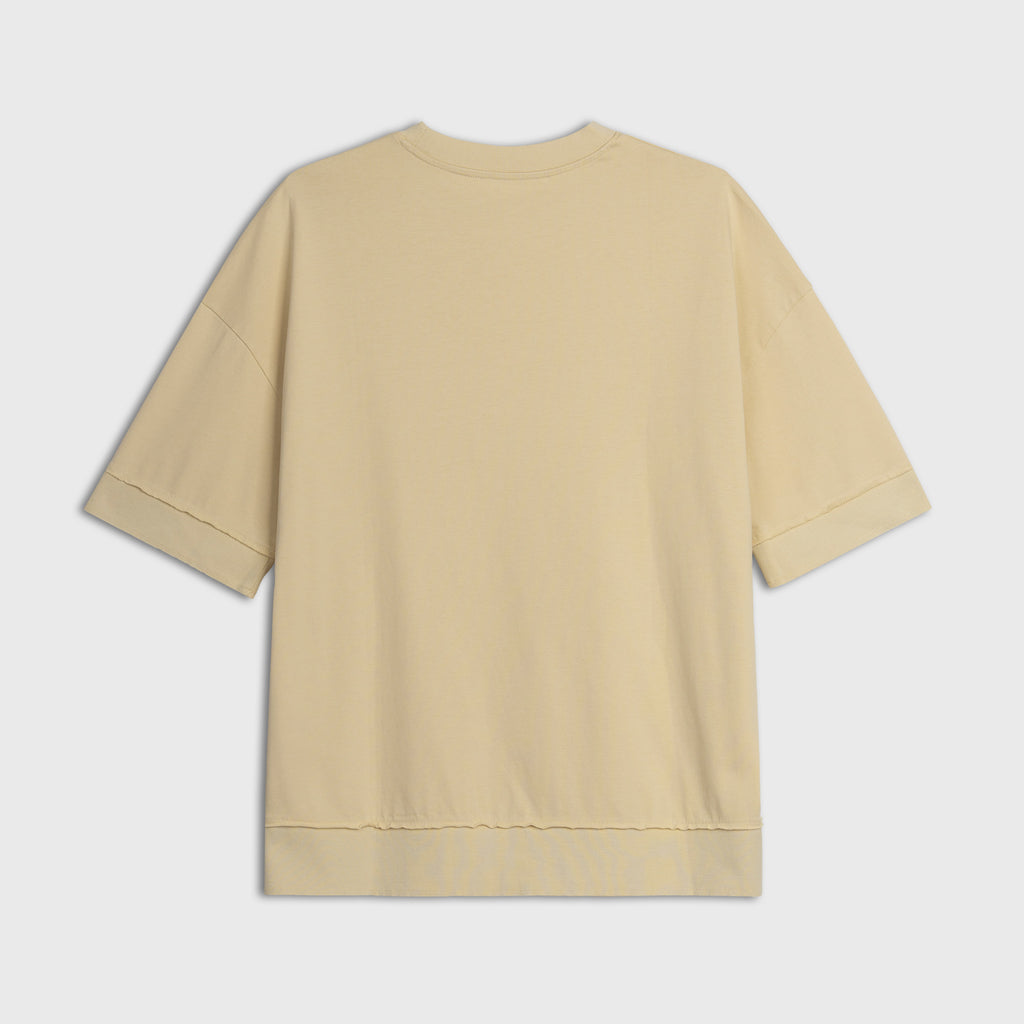 Yellow t-shirt on a light gray background