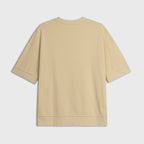 Yellow t-shirt on a light gray background
