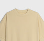 Yellow tshirt on a light gray background