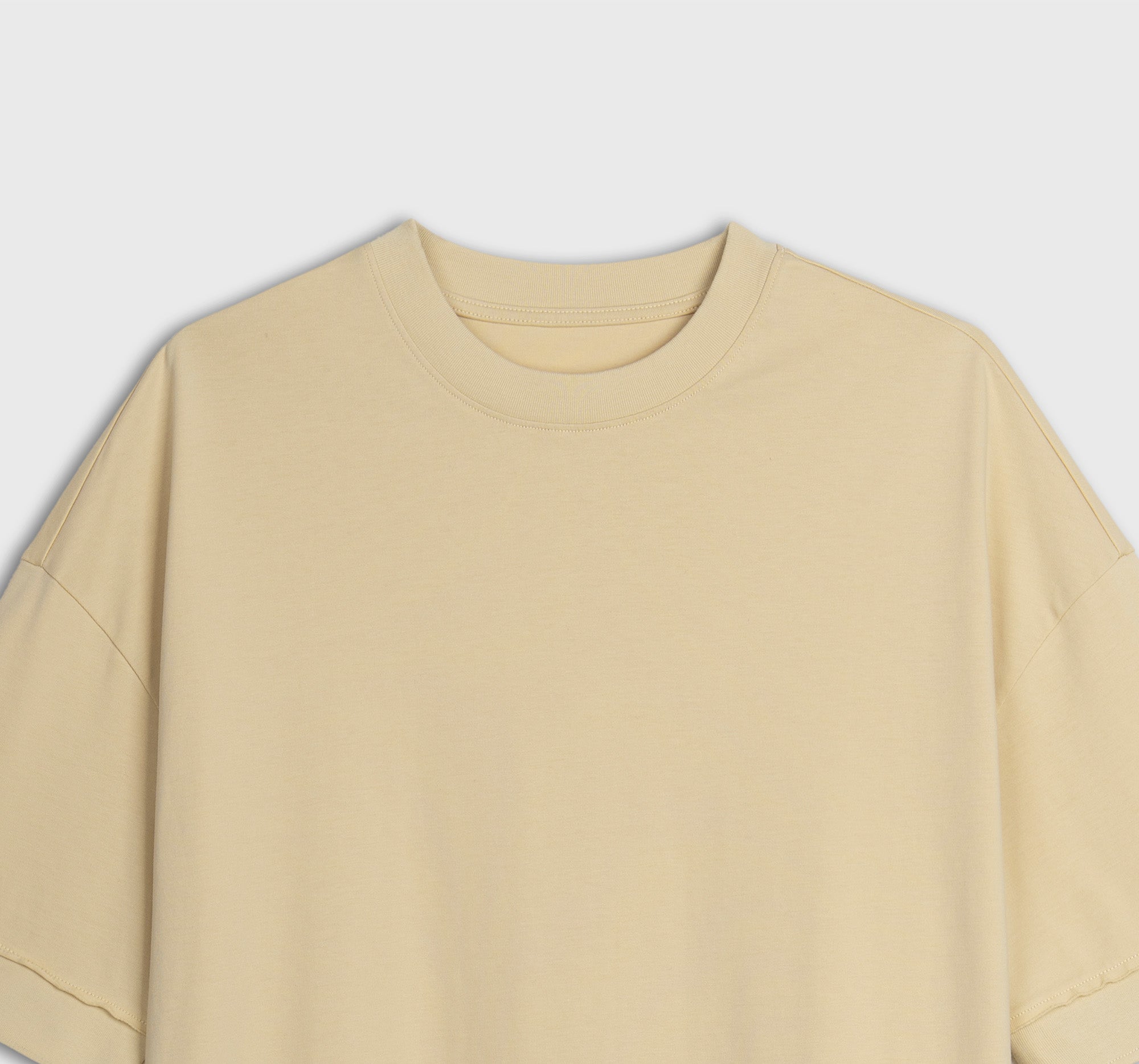 Yellow tshirt on a light gray background
