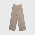 Beige pants on a light gray background