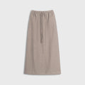 Beige skirt with drawstring on a light gray background