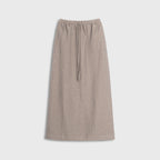 Beige skirt with drawstring on a light gray background
