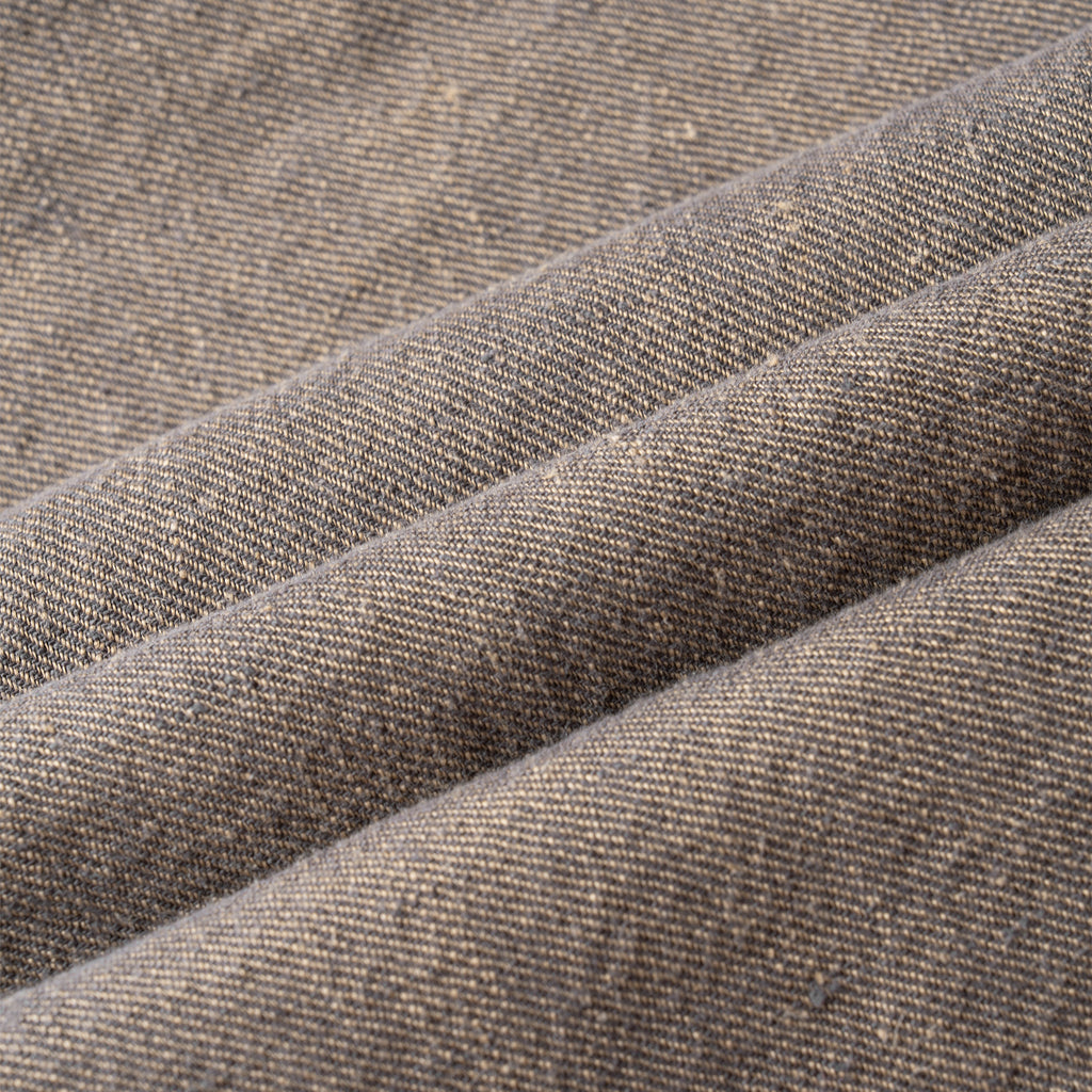 Close-up of brown textured hemp skirt with visible stitching
