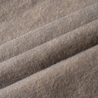 Close-up of brown textured hemp skirt with visible stitching
