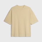 Yellow t-shirt on a light gray background
