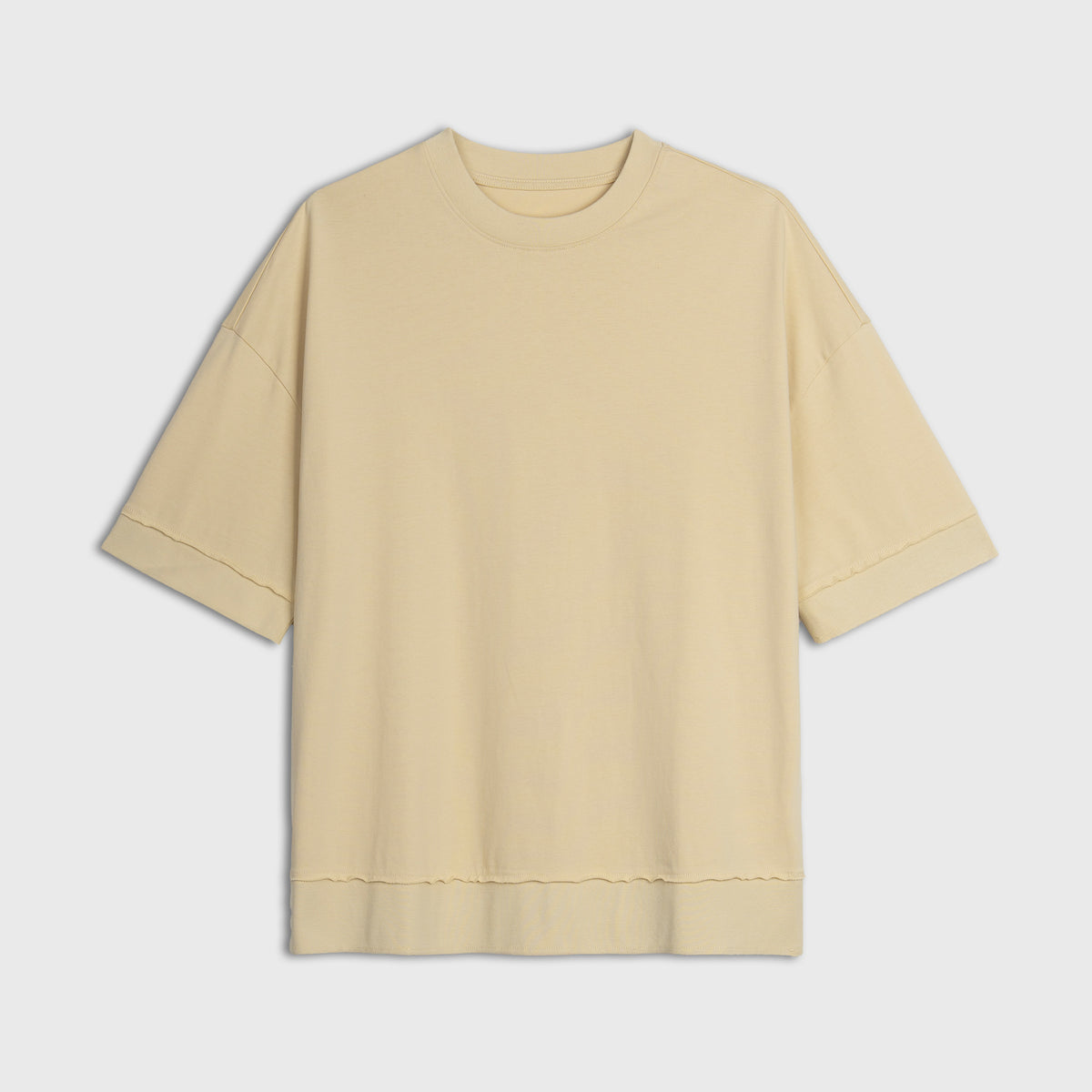 Yellow t-shirt on a light gray background