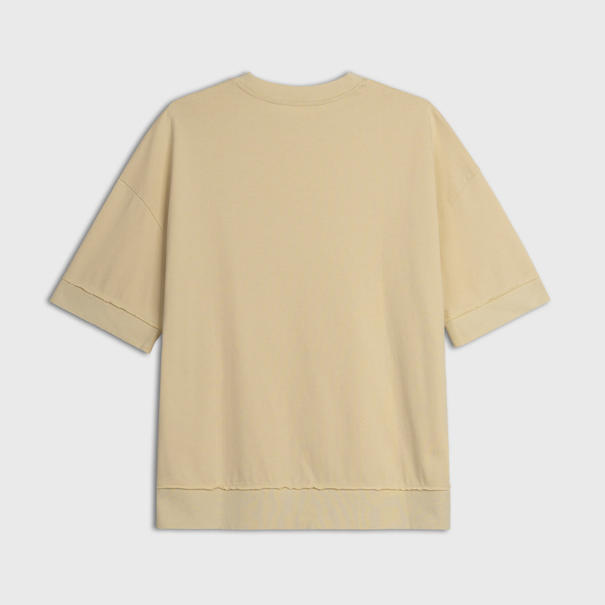 Yellow t-shirt on a light gray background