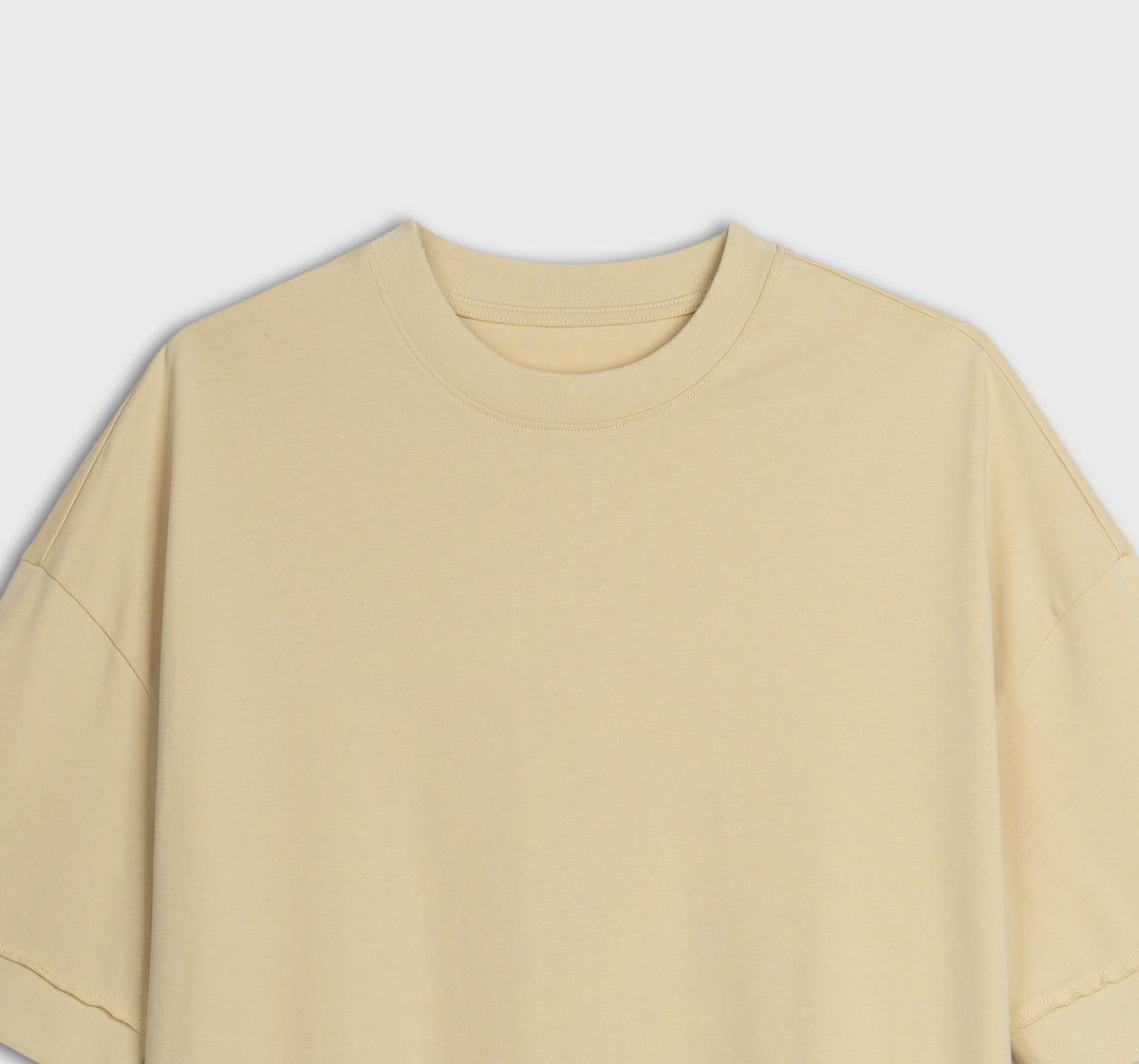Yellow tshirt on a light gray background