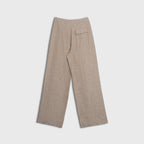 Beige pants on a light gray background